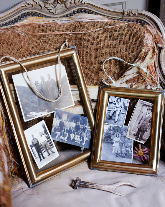 Brass antiqued photo frames.