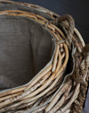 Large rattan log baskets with rope handles
