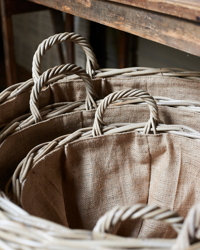 large rattan log baskets with hessian liner
