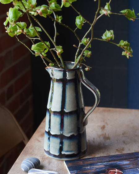 Blue/green Glazed stoneware water jug with black stripes