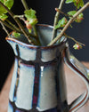 Blue/green Glazed stoneware water jug with black stripes