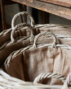 Set of 3 rattan log baskets with hessian liner