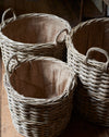 Set of 3 rattan log baskets with hessian liner
