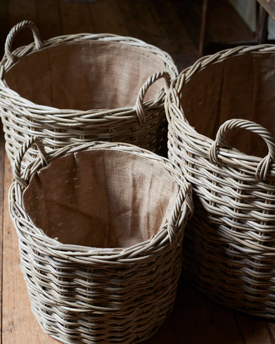 Set of 3 rattan log baskets with hessian liner