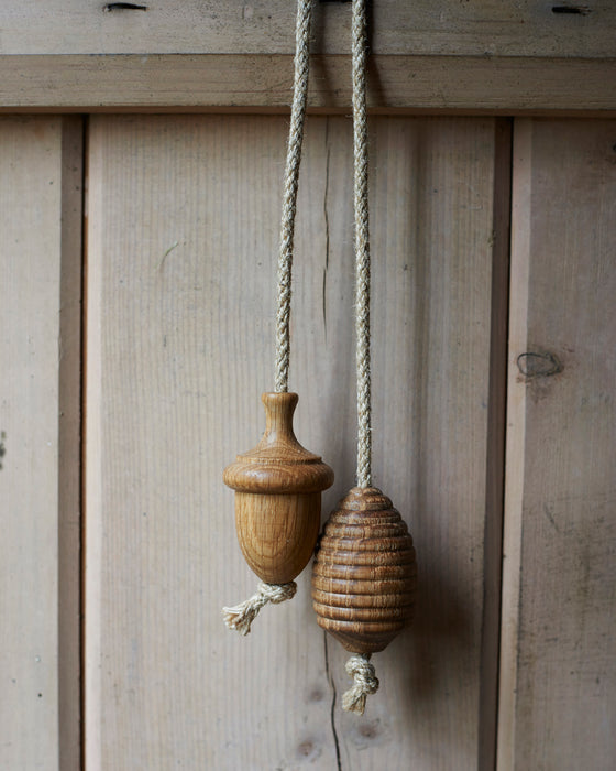 Rustic oak light pull with hemp cord-acorn/beehive