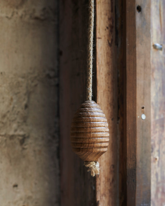 Rustic oak light pull with hemp cord-acorn/beehive