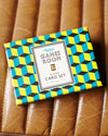 2 sets of playing cards presented in a retro box