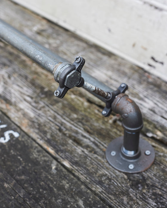 Industrial reclaimed metal towel rail 3/4-1/2 inch pipe.