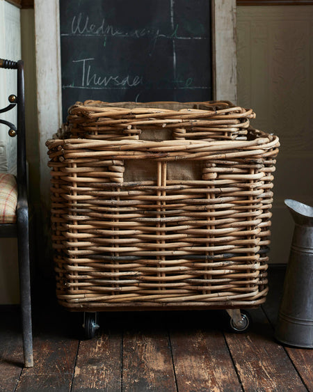 Large square rattan log basket on wheels