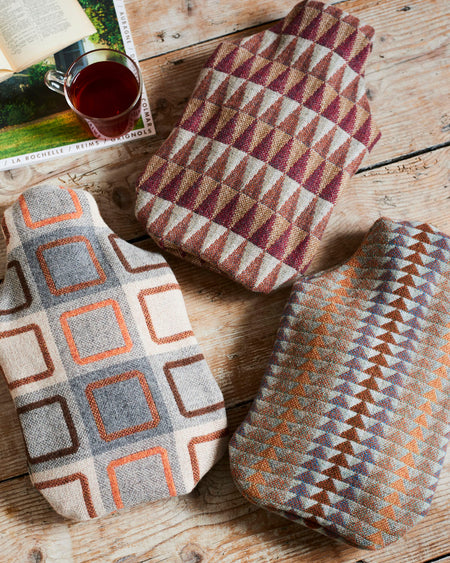 100% merino lambswool retro hot water bottle covers.