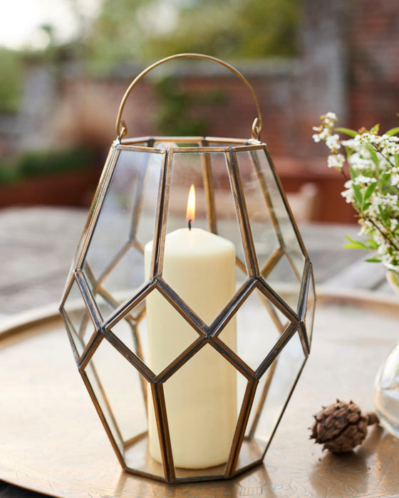Antique look hand welded glass and brass lantern.