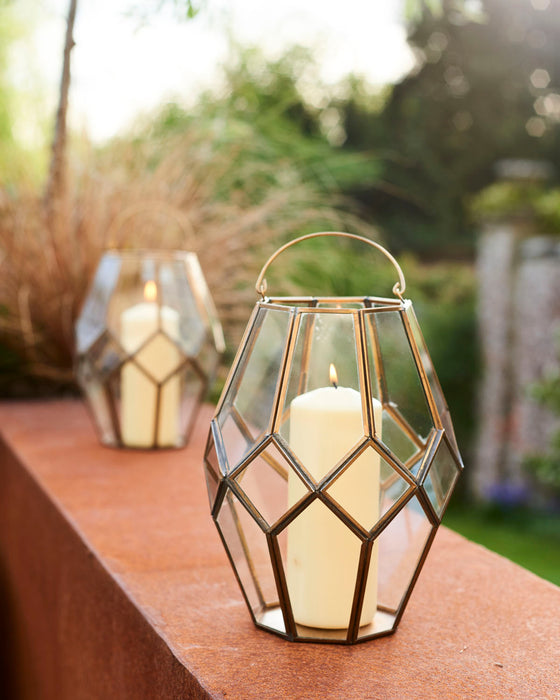 Antique look hand welded glass and brass lantern.