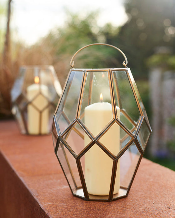 Antique look hand welded glass and brass lantern.