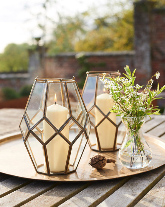 Antique look hand welded glass and brass lantern.