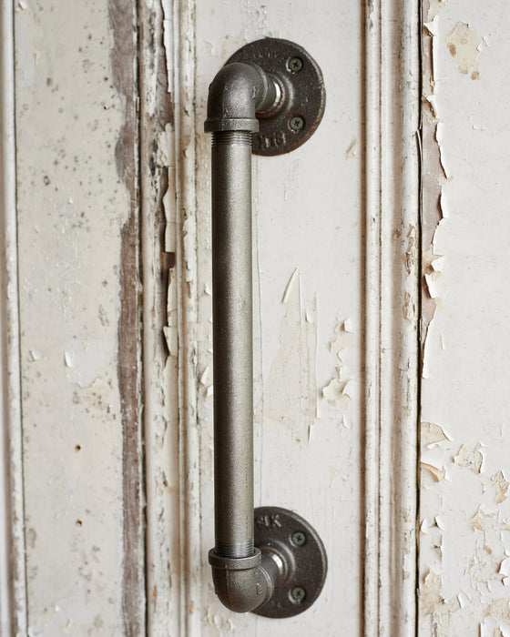 A pair of heavy duty industrial metal door handles