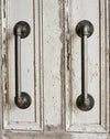 A pair of heavy duty industrial metal door handles