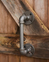 A pair of heavy duty industrial metal door handles