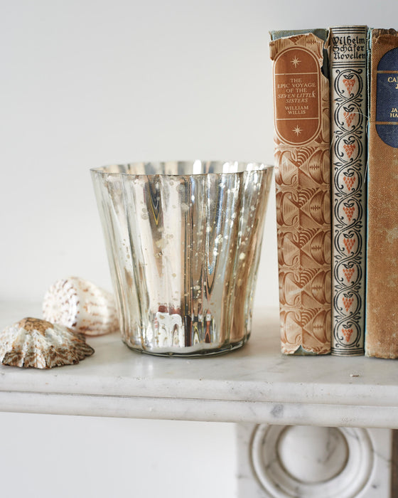 Large antiqued silver fluted votive t - light holders.