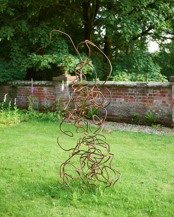 Large twisted steel sculpture- rusted