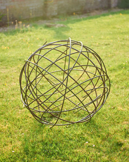 rusted circular steel sculpture