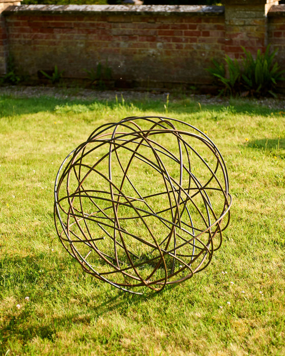 rusted circular steel sculpture