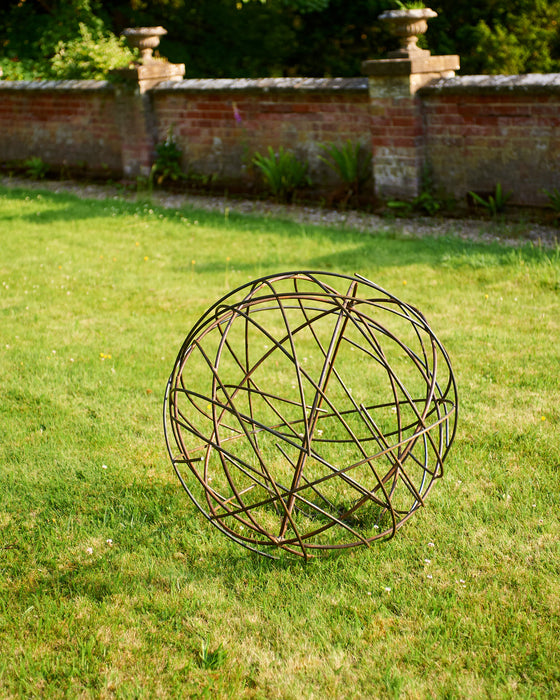 Twisted steel circular ball sculpture