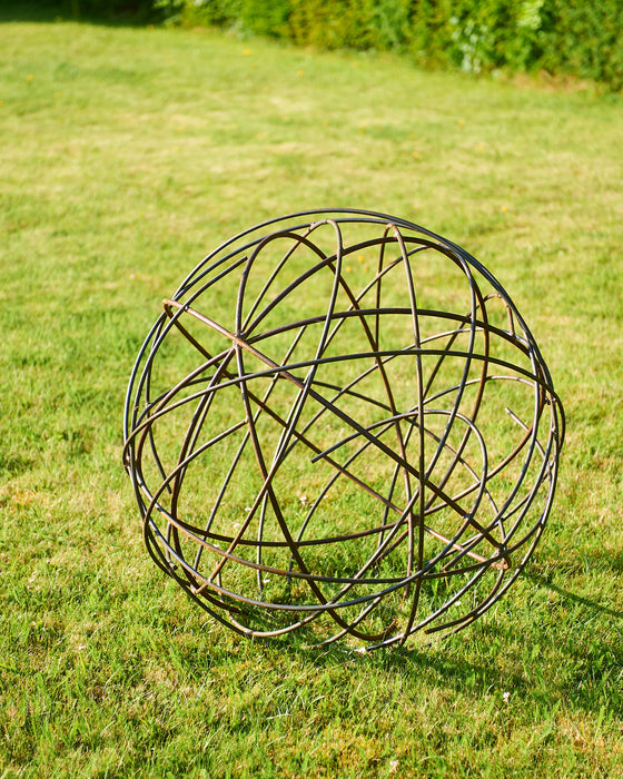 Twisted steel circular ball sculpture