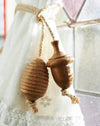 Rustic oak light pull with hemp cord-acorn/beehive