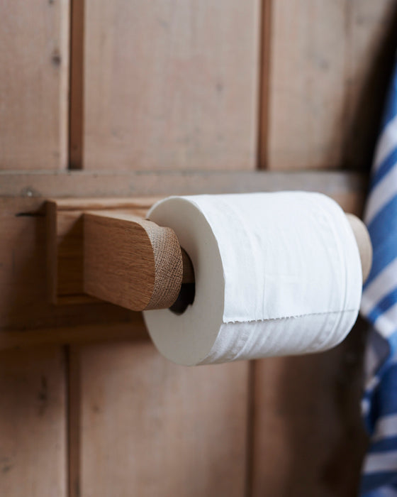 Handmade Oak loo roll holder.