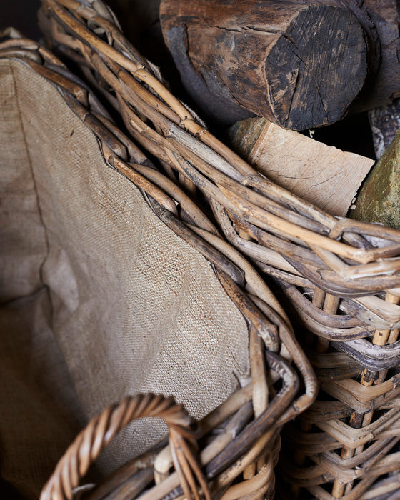 Large rustic rattan log baskets - wheels & hessian liner