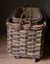 Large rustic rattan log baskets - wheels & hessian liner
