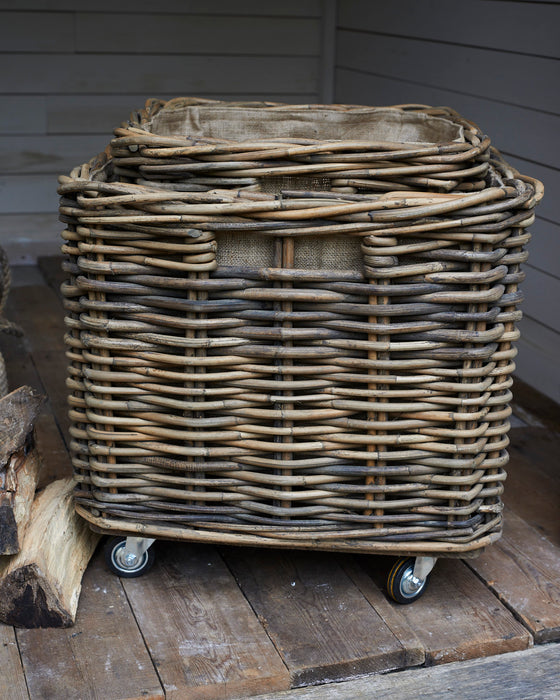 Large square rattan log basket on wheels