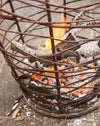 Bespoke twisted metal braziers  with fire