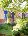 Kids washing line with mini pegs in a calico drawstring bag