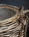 Large rattan log baskets with rope handles