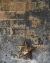 Antique brass star T- light holder on a linked chain
