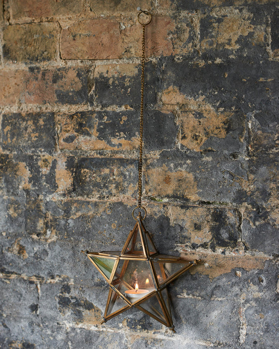Antique brass star T- light holder on a linked chain
