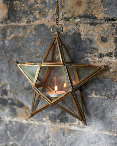 Antique brass star T- light holder on a linked chain