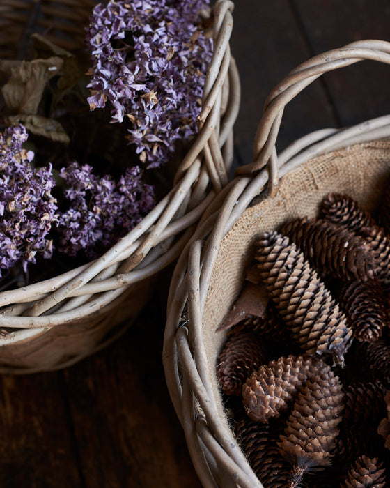 Wild wicker log basket with hessian liner and ear handles