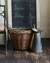 Wild wicker log basket with hessian liner and ear handles
