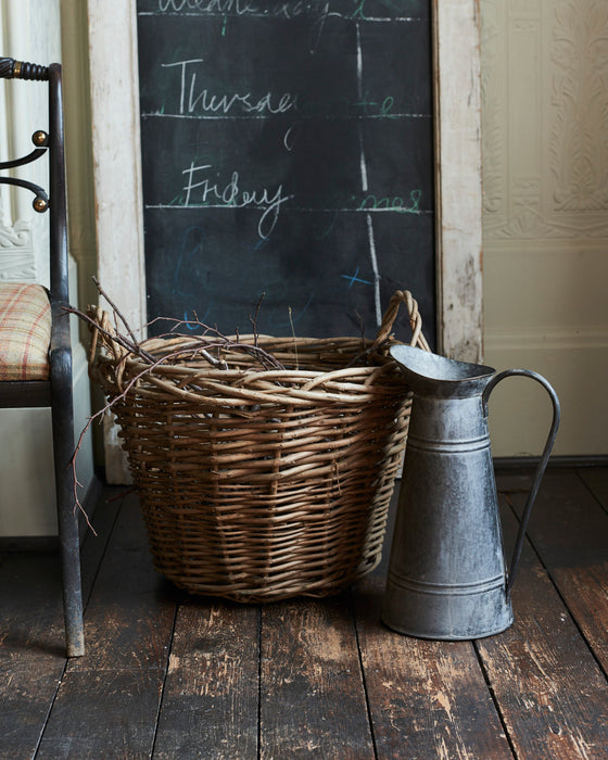 Wild wicker log basket with hessian liner and ear handles